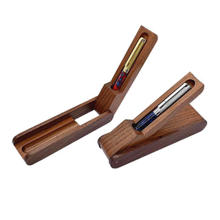 Folding Black Walnut Pen Box. Open, displayed with a pen