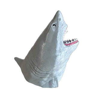 Shark figurine pen holder with an open mouth on a white background