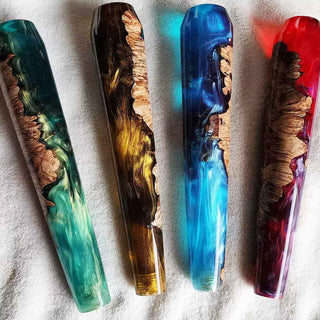 Four artistic handles with natural wood patterns and colorful  alumilite clear slow resin 