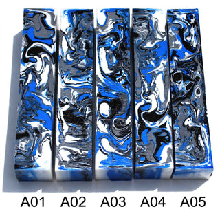 John's handmade Alumilite pen blanks A01 through A05 featuring blue, black, gray and white marbled resin swirls