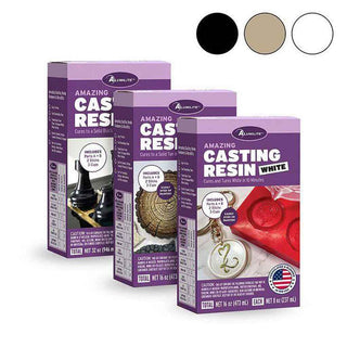 Three boxes of Alumalite Amazing Casting Resin on a white background