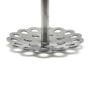 Close-up of curved 304 stainless steel avocado masher base designed for mashing guacamole inside a bowl