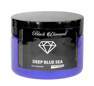 Jar of 'Deep Blue Sea' pigment by Black Diamond Pigments on a white background