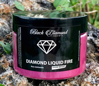 Black Diamond Pigments container labeled 'Diamond Liquid Fire' on a natural background