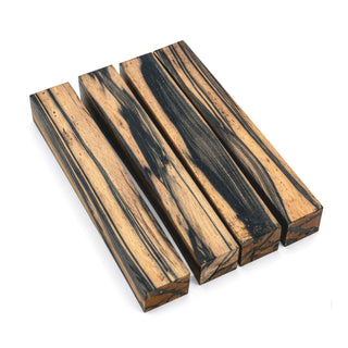 Four Black & White Ebony pen blanks displaying unique natural black striping and exotic hardwood figure