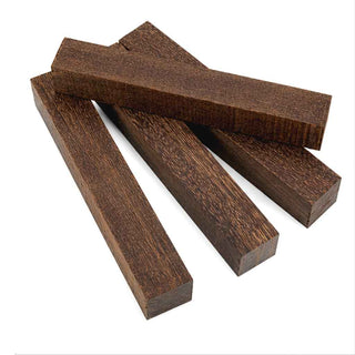 Brazilian Ebony pen blanks with dark chocolate-brown color and fine grain arranged for custom pen turning and woodworking projects. Group of 4