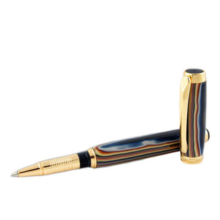 Handcrafted pen turned from a Desert Mirage Poly Resin Pen Blank showcasing rich desert-inspired striped layers with elegant gold hardware.