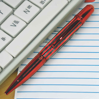 Diplomat Ballpoint Pen Kit in Red Ti, Next to a computer keyboard
