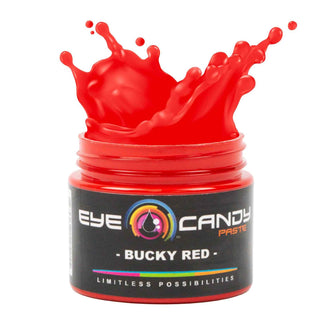 Red paste container labeled 'Eye Candy Paste Bucky Red' with a splash effect on a white background.