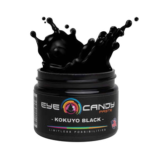 Jar of Eye Candy Paste Kokuyo Black with splashing black substance on a white background