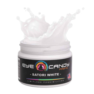 Jar of Eye Candy Paste Satori White with white paste spilling out on a white background