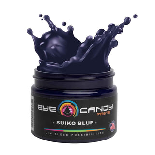 Jar of Eye Candy Paste Suiko Blue with a splash of blue substance on a white background