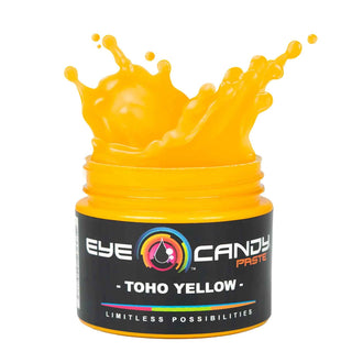 Jar of Eye Candy Paste in Toho Yellow with a splash design on a white background