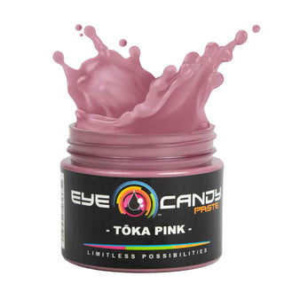 Toka Pink eye candy paste in a jar with splashes on a white background