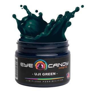 Jar of Eye Candy Paste Uji Green with green liquid splash on a white background