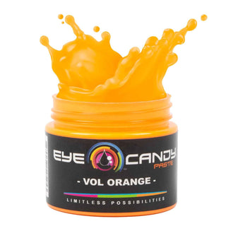 Jar of orange paste with 'Eye Candy Paste' branding on a white background