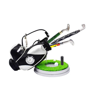 Golf bag pen holder with clock and with leatherette finish, realistic details, and storage compartments for displaying handmade pens.