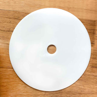 Underhill Casting HDPE Bottom Disc for 2.5-gallon pressure pots featuring a smooth white non-stick HDPE surface with a 1-inch center finger hole for easy removal.