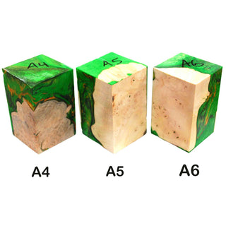 Live Edge hybrid egg project blank combining maple burl and colorful Alumilite resin for woodturning projects. Green, orange, black with maple burl