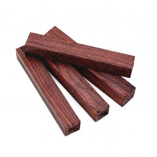 Kingwood pen blanks with deep reddish-brown color, black streaking, and exotic rosewood grain for custom pen turning and woodworking projects. Group of 4