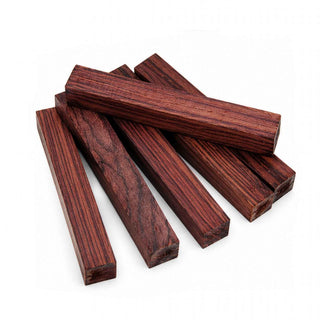Kingwood pen blanks with deep reddish-brown color, black streaking, and exotic rosewood grain for custom pen turning and woodworking projects. Group of 5