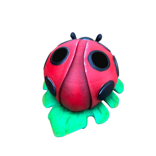 Back view of the hand-painted 3D printed ladybug pen holder showing detailed wing design.