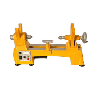 3D printed and hand‑painted miniature lathe pen holder used as a desk organizer. Yellow