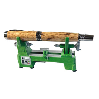 3D printed and hand‑painted miniature lathe pen holder used as a desk organizer. With a pen