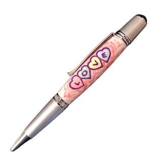 Candy heart Valentine’s Day pen blank resin filled. On a Regency Pen