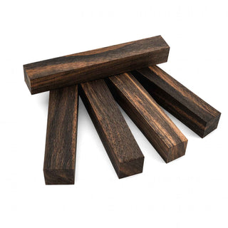 Macassar Ebony pen blanks with dramatic black and brown striping, fine texture, and luxurious natural figure for custom pen turning and woodworking projects. Group 1