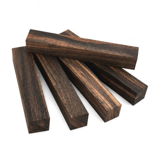 Macassar Ebony pen blanks with dramatic black and brown striping, fine texture, and luxurious natural figure for custom pen turning and woodworking projects. Group 2