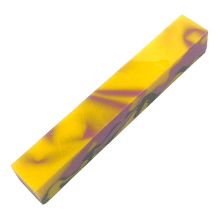 Banana Parfait acrylic pen blank with opaque yellow base and pink and black swirl accents.Side view