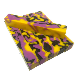 Banana Parfait acrylic pen blank with opaque yellow base and pink and black swirl accents. Group