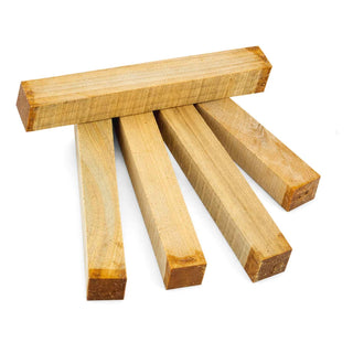 Satinwood pen blanks with pale yellow to golden honey coloration and fine grain for custom pen turning and premium woodworking projects. Group 1