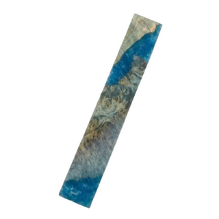 Decorative wooden block with blue and gold patterns on a white background