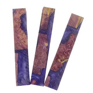 Three purple and gold marbled wooden strips on a white background
