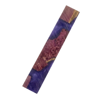 Wooden object with purple and brown pattern on a white background