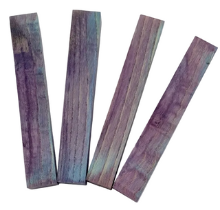 Four pieces of purple and blue striped wood on a white background