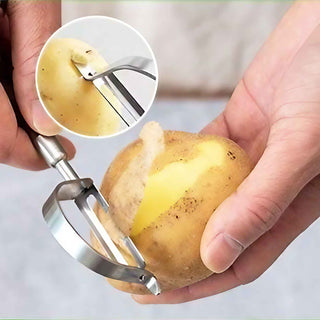 D-Shaped straight blade stainless steel vegetable peeler peeling a fresh potato
