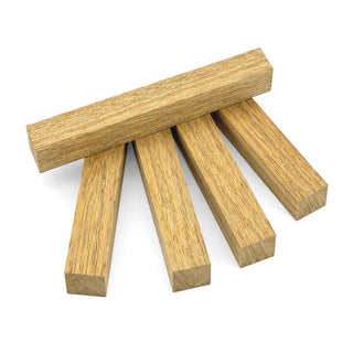 White Limba wood pen blanks displaying warm golden tones and subtle grain patterns for custom turning projects.